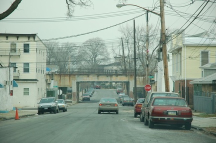 Staten Island North Shore right-of-way crossing over Faber Street at Grove Avenue. Photo looks north. Photo taken by Brian Weinb