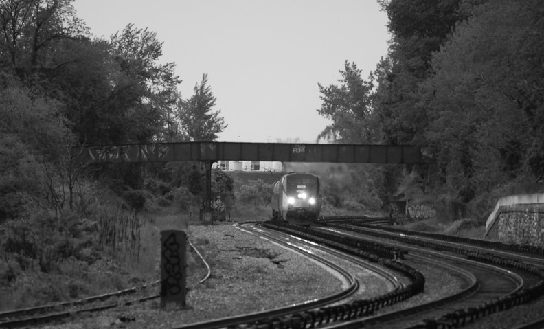 Amtrak P32AC-DM 704 @ Riverdale (Empire Service train #242). Photo taken by Brian Weinberg, 5/20/2007.