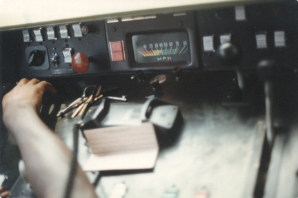 PATCO train operator's dash during a fan trip. Note that the speedometer shows the current speed as 60+ MPH. Photo taken by John