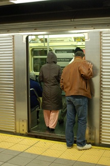 R-32 3825 @ Jackson Heights-Roosevelt Avenue (E). Note that the car is not crowded at all. Photo taken by Brian Weinberg, 11/25/