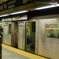 R-32 3824 & 3825 @ Jackson Heights-Roosevelt Avenue (E). Note that the cars are not crowded at all. Photo taken by Brian Wei