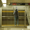 Unknown hooligan attempting to get around the gate in the 32 St underpass to the uptown local platform @ 34 St - Penn Station (1