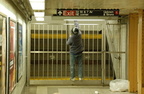 Unknown hooligan attempting to get around the gate in the 32 St underpass to the uptown local platform @ 34 St - Penn Station (1