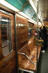 R-62A 1925 @ Times Sq - 42 St (S). Car is wrapped for Swiffer. Photo taken by Brian Weinberg, 2/22/2008.