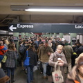 Crowded conditions on the IRT downtown platform @ Times Sq - 42 St (1/2/3). Note the (1) on the express track making express sto