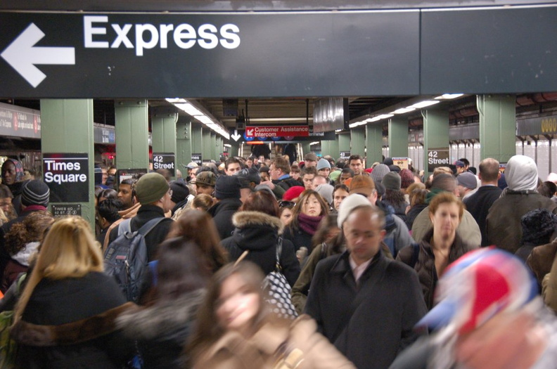 Crowded conditions on the IRT downtown platform @ Times Sq - 42 St (1/2/3). Note the (1) on the express track making express stops to 14 St. Photo taken by Brian Weinberg, 2/22/2008. DSC_0310.jpg