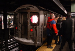 R-62A 2395 @ Times Sq - 42 St (1). Note that the (1) on the express track is making express stops to 14 St. Photo taken by Brian