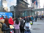 Free coffee and donuts in front of the Millennium hotel.   Photo taken by Brian Weinberg, 11/24/2003.