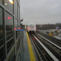 View from a window on the lower level of the Federal Circle station, looking at an outbound train leaving (from here can head to