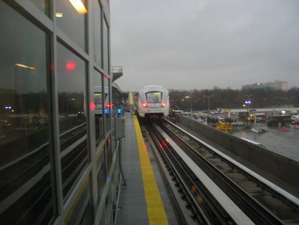 View from a window on the lower level of the Federal Circle station, looking at an outbound train leaving (from here can head to