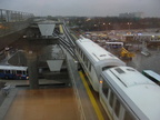 View from a window of the Federal Circle station, looking at an outbound train leaving (from here can head to either Jamaica or