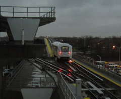 Jamaica bound AirTrain leaving Federal Circle station. NOTE THE ARCING!