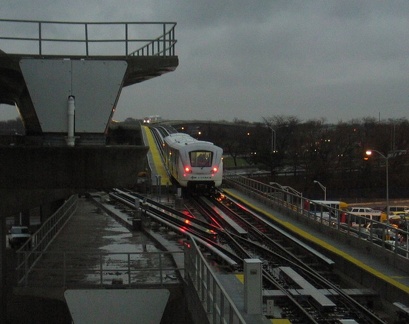 Jamaica bound AirTrain leaving Federal Circle station. NOTE THE ARCING!