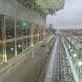 View out the HUGE railfan window of an outbound AirTrain stopped at the Federal Circle station.