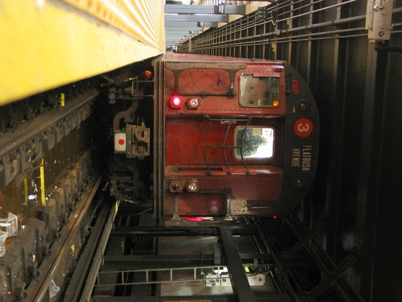 R-33WF 9310 @ Flatbush Av on a MOD trip. Photo taken by Brian Weinberg, 12/21/2003.