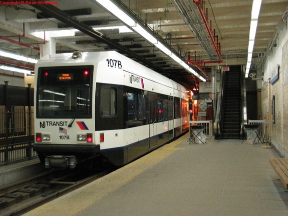 NJT NCS LRV 107B @ inbound platform at Newark Penn Station. Photo taken by Brian Weinberg, 2/16/2004.