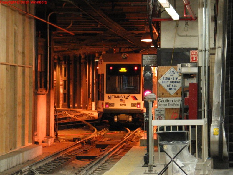 NJT NCS LRV 107B @ inbound platform at Newark Penn Station. Photo taken by Brian Weinberg, 2/16/2004.