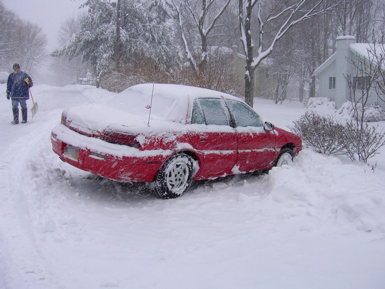 My beloved 1995 Pontiac Grand AM SE V-6 in the snow. This car has since been scrapped. Photo taken by Brian Weinberg, 12/25/2002
