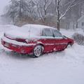 My beloved 1995 Pontiac Grand AM SE V-6 in the snow. This car has since been scrapped. Photo taken by Brian Weinberg, 12/25/2002