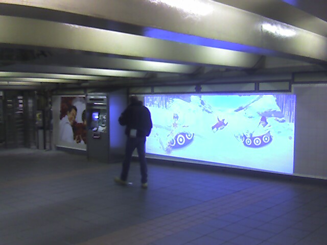 a Target video advertisement by way of a Monster Media projection system @ 34 St - Herald Sq. This is in the 35 St mezzanine. Photo taken by Brian Weinberg, 11/20/2006. target_video_ad.jpg