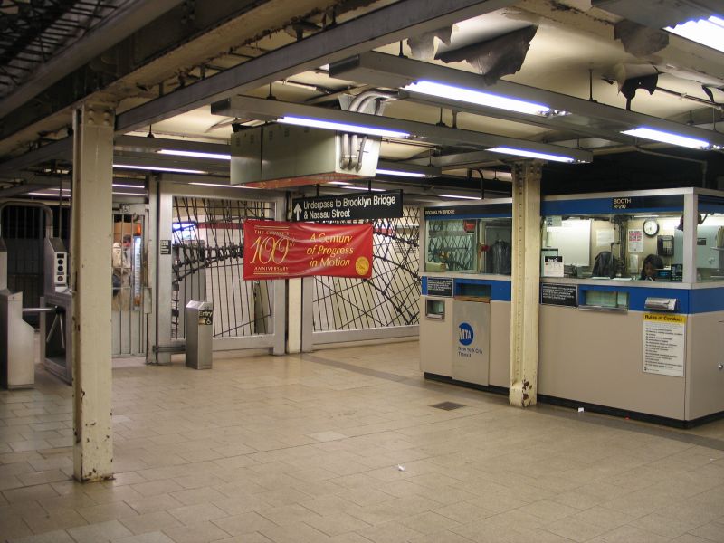 Centennial Banner next to Booth R-210 @ Brooklyn Bridge. Photo taken by Brian Weinberg, 10/26/2004.
