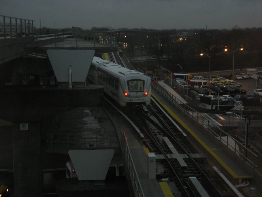 Howard Beach bound AirTrain leaving Federal Circle station.