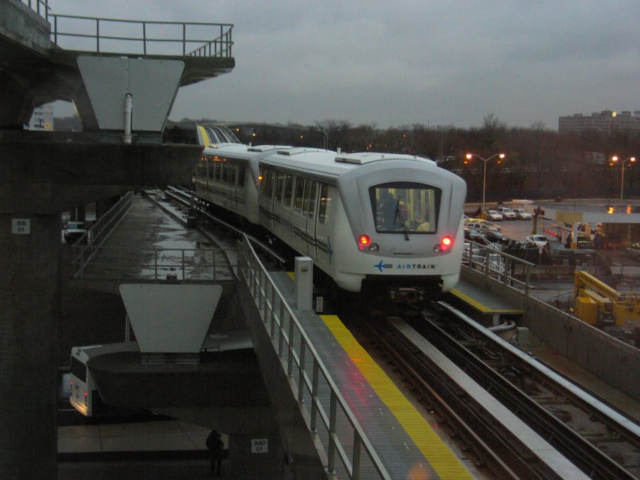 Howard Beach bound AirTrain leaving Federal Circle station.