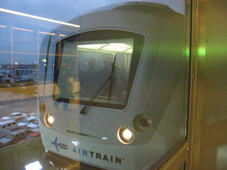 Head on shot of an outbound AirTrain stopped at the Federal Circle station.