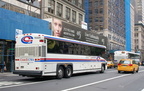 CoachUSA / Shortline / Hudson Transit Lines MCI 70329 @ 42 St &amp; 5 Av. Photo taken by Brian Weinberg, 7/28/2006.