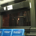 Some guy got pissed that the bus left without him. He knocked on the door and then knocked hard on the window, smashing it. Phot