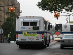 NYCT Orion V 6033 II and RTS 8857 @ Kingsbridge Ave and 231 St (Bx7 and Bx20). Note that the rear of the bus is painted white in