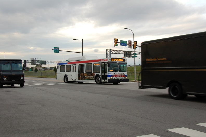 SEPTA 5612H @ 10th Street & Packer Av (Rt 68 UPS Terminal). Note the adjacent UPS trucks. - SEPTA 5612H @ 10th Street & Packer Av (Rt 68 UPS Terminal). Note the adjacent UPS trucks. DSC_3366.jpg
