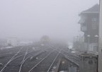 An M-1 trainset fades into the fog @ Jamaica. Photo taken by Brian Weinberg, 02/23/2003. (81kb)