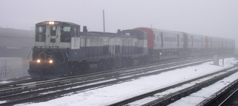 LIRR M-7 delivery @ Jamaica.  Photo taken by Brian Weinberg, 02/23/2003. (104kb)