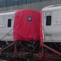 LIRR M-7 7051 & 7040 (delivery) @ Jamaica. DO NOT HUMP. Photo taken by Brian Weinberg, 2/23/2003.