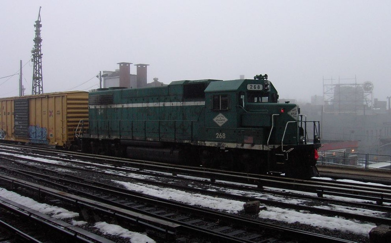 NY&amp;A GP38-2 268 brings up the rear of a freight consist @ Jamaica. Photo taken by Brian Weinberg, 02/23/2003. (100kb)