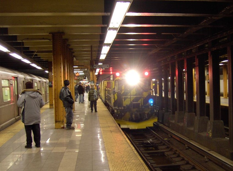 Work train @ 36 St (N). The diesel was in &quot;diesel&quot; mode and filled the station with smoke. Photo taken by Brian Weinbe