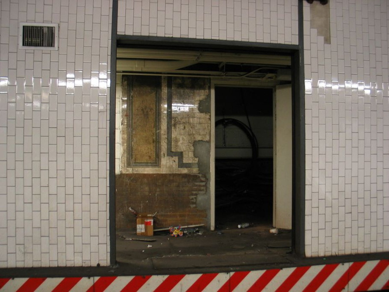 Open door to the sealed up northbound side platform @ 14 St-Union Square (4/5/6). Note the original tile seen on the inside wall. Photo taken by Brian Weinberg, 1/4/2004. IMG_8093.jpg