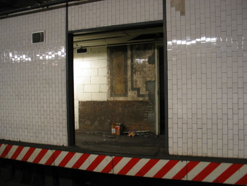Open door to the sealed up northbound side platform @ 14 St-Union Square (4/5/6). Note the original tile seen on the inside wall. Photo taken by Brian Weinberg, 1/4/2004. IMG_8095.jpg