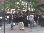 Crowd of people waiting outside the subway entrance on the southwest corner of 42 St &amp; 5 Av. Station was closed due to a 12-