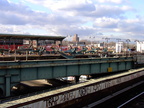 Long abandoned middle platform and current Canarsie-bound Atlantic Av (L) platform. Photo by Brian Weinberg, 11/27/2002. (179k)