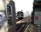 R-143 8188 sits while another R-143 train enters the station. Photo taken by Brian Weinberg, 12/29/2002. (78k)