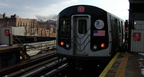 An R-143 (L) train leaves the station. Photo taken by Brian Weinberg, 12/29/2002. (72k)