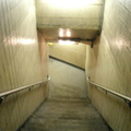 South Ferry (1/9). Stairs leading down to the inner loop. Station was closed due to 9/11. Photo taken by Brian Weinberg, 6/30/20