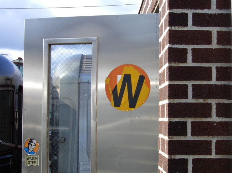 Door to the little brick building at the North/East end of the platform. Photo by Brian Weinberg, 11/27/2002. (81k)