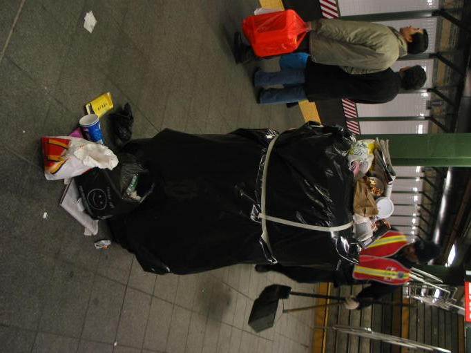 Garbage can covered with a garbage bag @ Times Square (1/2/3/9). Photo taken by Brian Weinberg on New Years Eve, 2003 (12/31/200