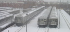 R-40M, R-42, and R-143 cars @ East New York Yard. Photo taken by Brian Weinberg, 02/17/2003. This was the Presidents Day Blizzar