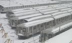 R-40M, R-42, and R-143 cars @ East New York Yard. Photo taken by Brian Weinberg, 02/17/2003. This was the Presidents Day Blizzar