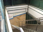 Looking down the stairs in a PATH kiosk @ Hoboken Terminal. Photo by Brian Weinberg, 01/26/2003.