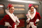 Rockettes Lauren Gaul, left, and Naomi Hubert ride the Arnines in service (incl. R-6 1300).